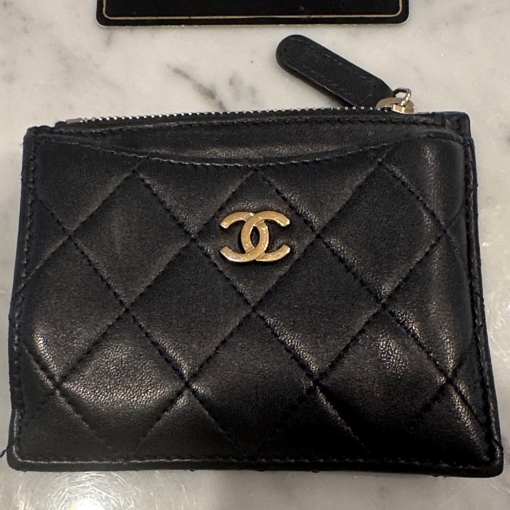 CHANEL Black Quilted Card Holder with Gold Logo